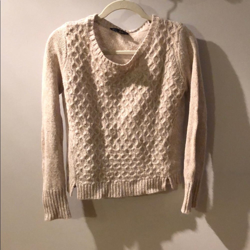 A tan sweater